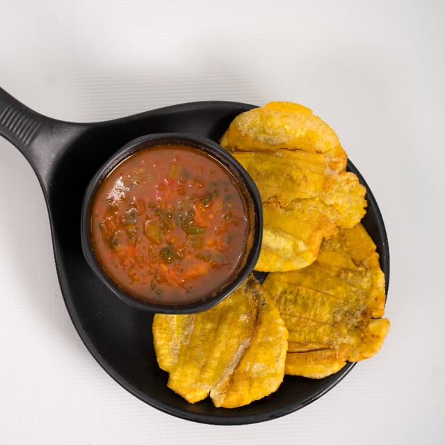 Green plantain W/ creole sauce.