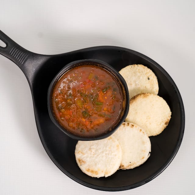 Corn patty W/  creole sauce.